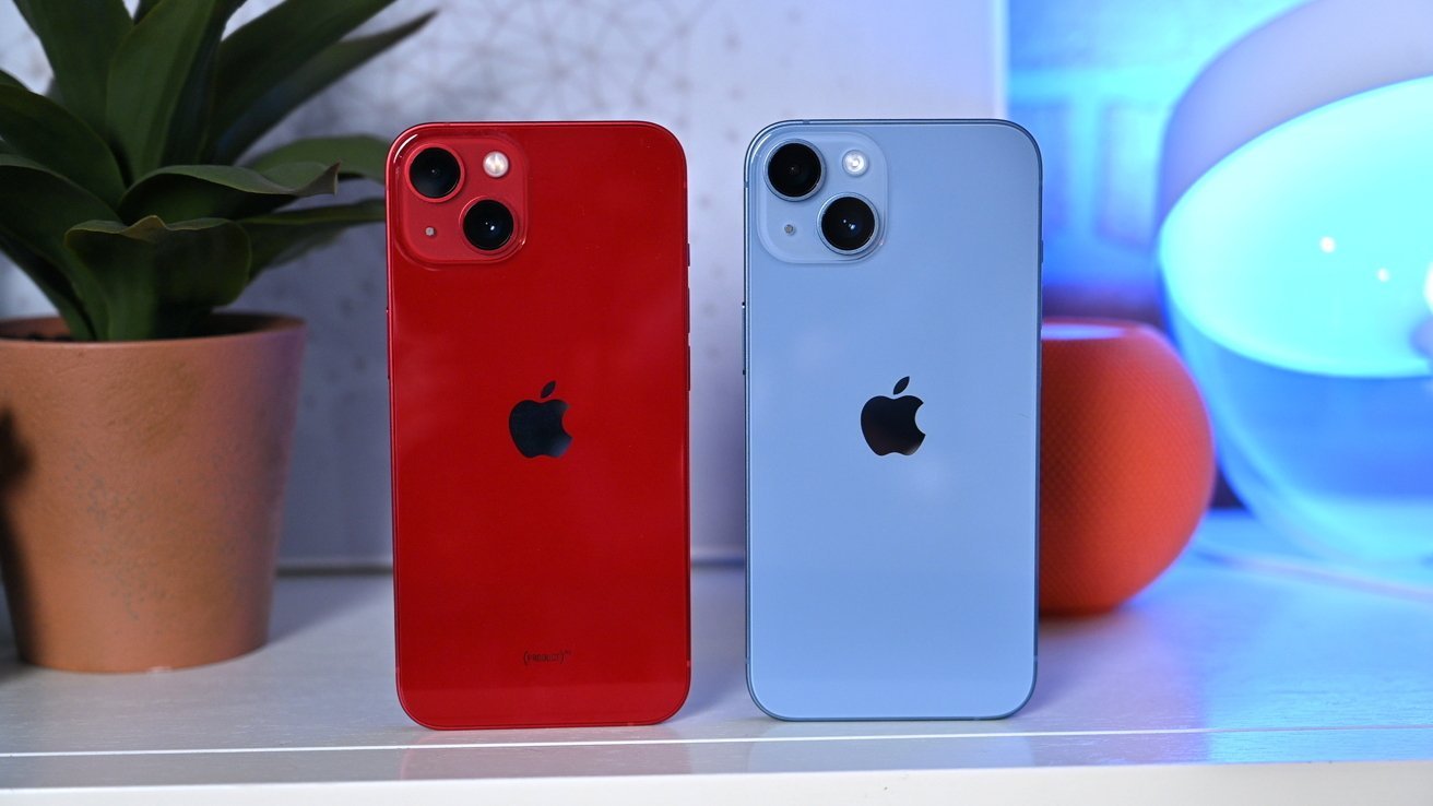 Two red and blue iPhones placed on a table, showcasing the appeal of refurbished devices for budget-conscious consumers.